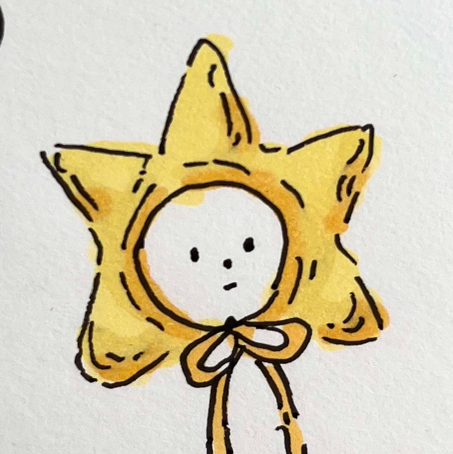 Character illustration with small face and yellow star hat